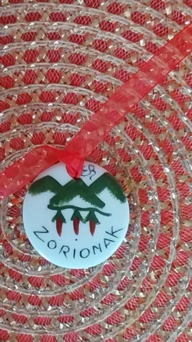 MEDAILLE RONDE PIMENTS ZORIONAK